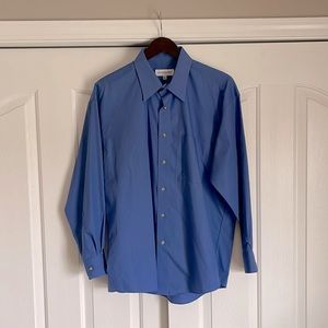 Yves Saint Laurent dress shirt. Blue. Size 16 1/2 32-33. In excellent condition.